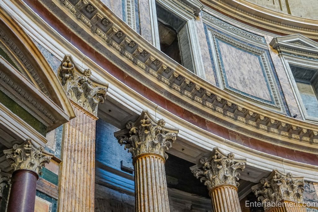 Interior wall of the Pantheon with marble columns and niches