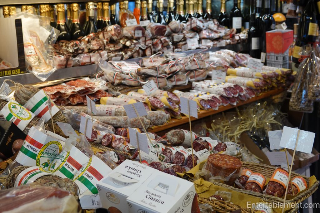 cured meats and wine in Roman market