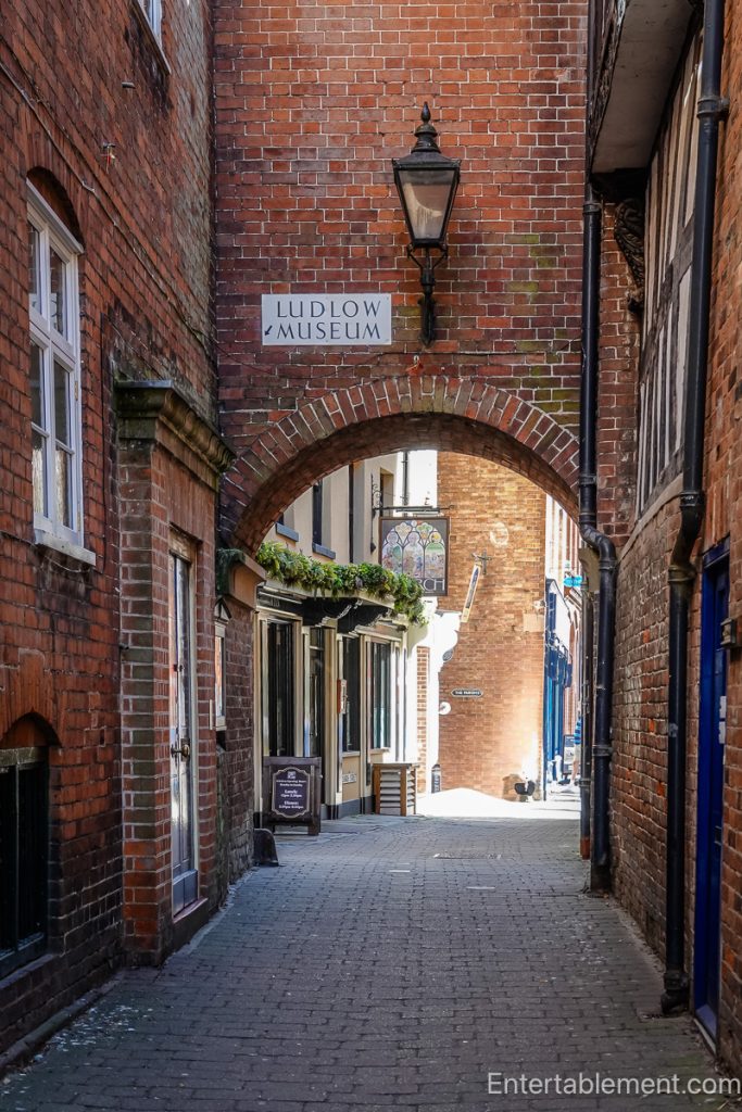 Historic passageway leading towards Ludlow Museum