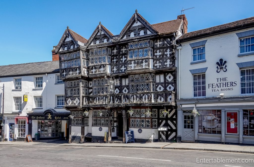 Ornate timber-framed façade of the Feathers Hotel in Ludlow